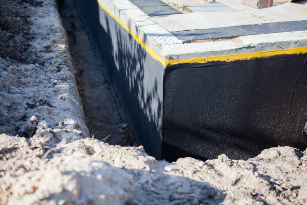 Professional Waterproofing technician working in New Franken, WI